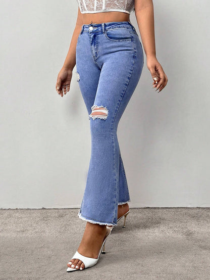 Jeans Acampanados Y Desgastados