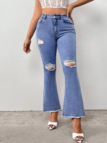 Jeans Acampanados Y Desgastados