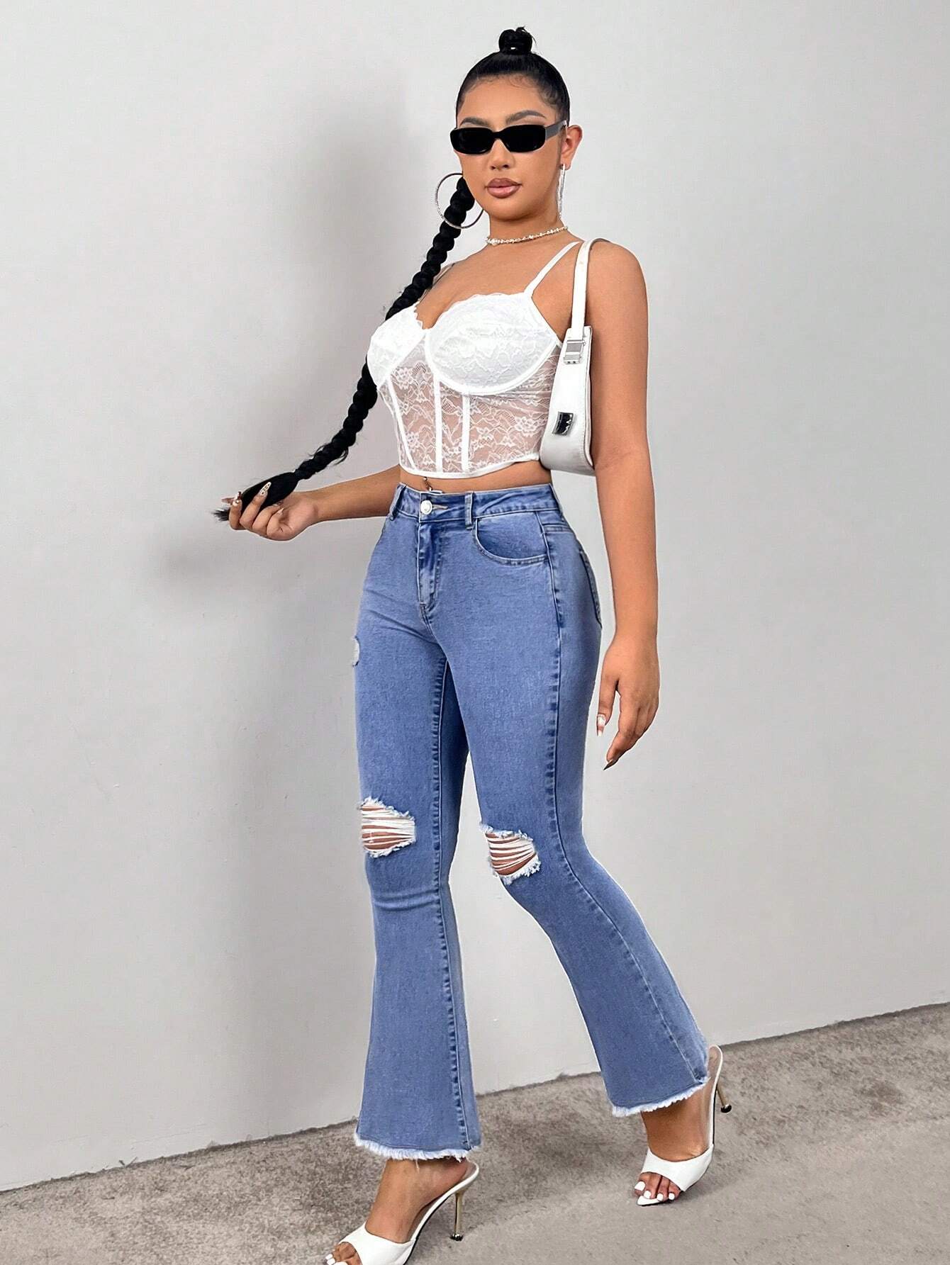Jeans Acampanados Y Desgastados