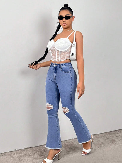 Jeans Acampanados Y Desgastados